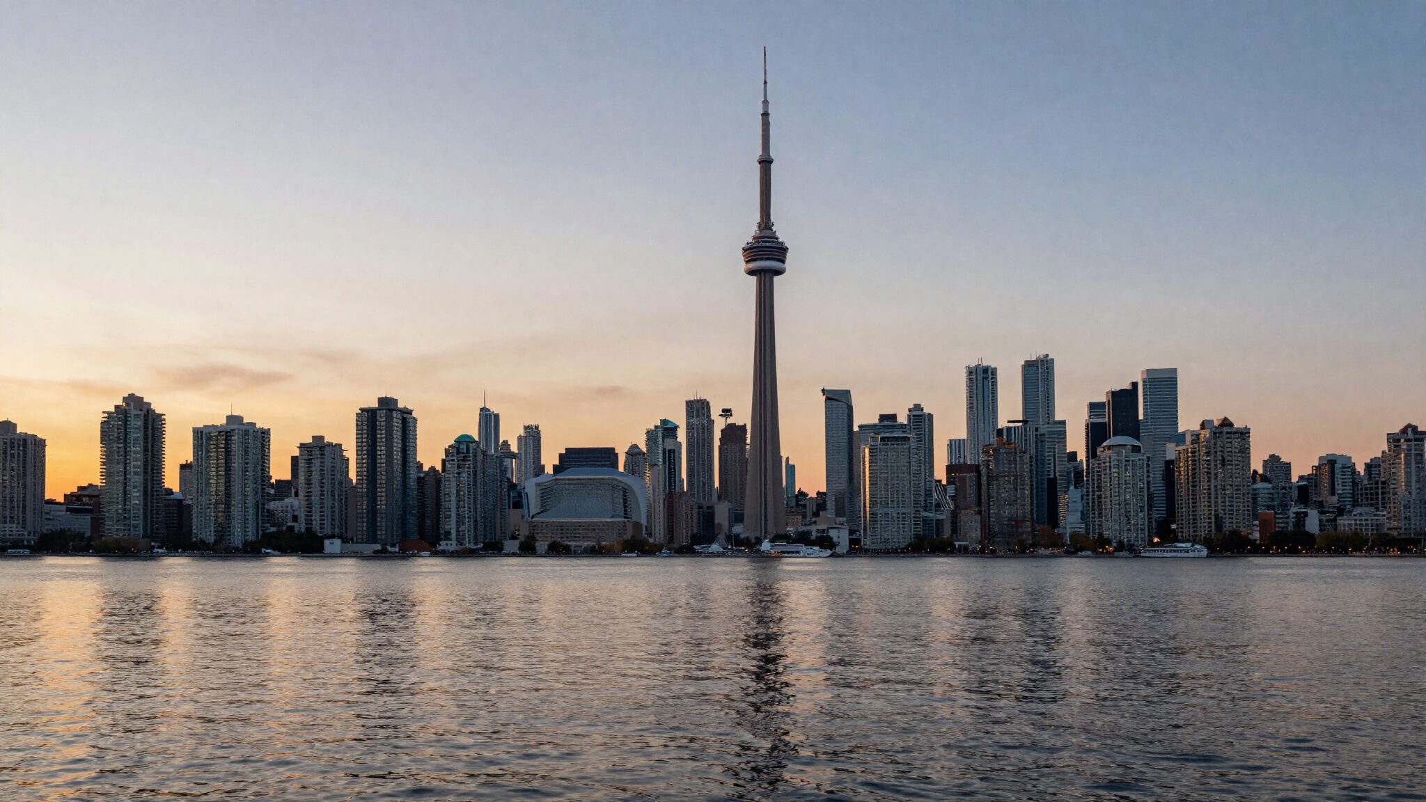 Toronto downtown skyline with CN Tower at sunset